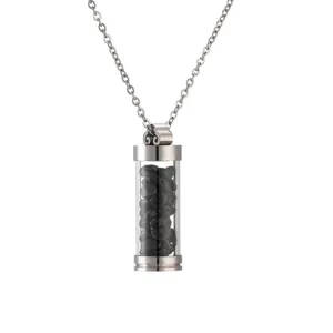 Perfume bottle necklace with black crystal stones and stainless steel cylinder pendant