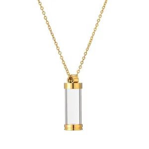 Minimalistische goldene Halskette mit klarem zylindrischem Anhänger für Parfüm