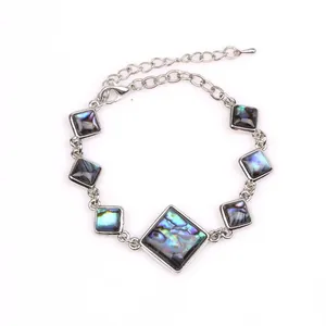 Silver chain bracelet with square abalone shell inlays and adjustable lobster clasp