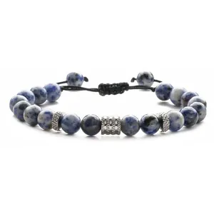 Adjustable beaded bracelet featuring blue sodalite natural stones and silver metal accents