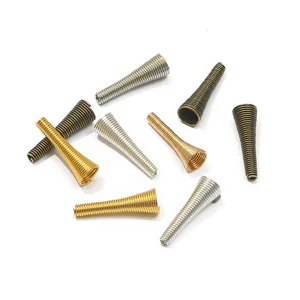 Close-up of spiral iron bead caps in gold, silver, and bronze for DIY jewelry making