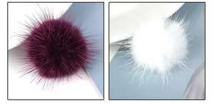 Detail view of 3.5cm fluffy mink fur balls in deep purple and white for DIY jewelry