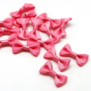 Soft pink satin ribbon bows for DIY hair accessories and craft ornament decorations