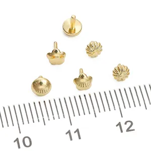 14K gold plated copper jewelry components with assorted textured stud patterns and flat base