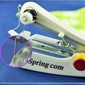 Portable manual sewing machine with yellow thread and a detailed needle view