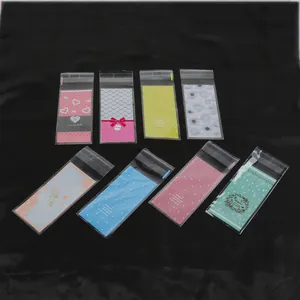 Detailed set of 8 self-adhesive lipstick packaging bags with cute floral and heart patterns