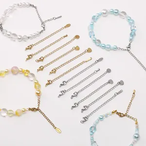 Colorful beaded bracelets with stainless steel extender chains and lobster clasps on white