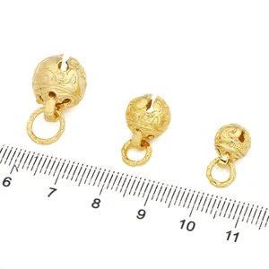 Three sizes of 18K gold plated hollow tiger bells with traditional patterns and scale