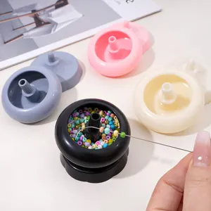 Kit de toupie à perles manuelle avec quatre bols en plastique colorés et aiguille courbe DIY