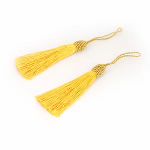Paire de glands en polyester jaune avec tête tressée dorée pour loisirs créatifs