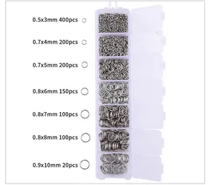 Assorted silver jump rings set for jewelry making in a transparent storage box