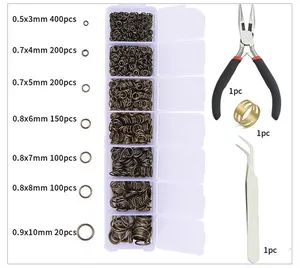 Detailed jewelry DIY kit with bronze jump rings, pliers, tweezers and ring opener tool