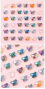 Macro view of colorful butterfly-shaped glass beads for DIY jewelry making and crafts