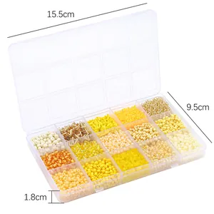 15-grid storage box with yellow glass seed beads for DIY jewelry making set