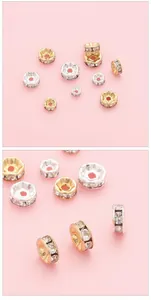 Macro shot of 14K gold and silver rondelle spacer beads with crystals for DIY jewelry