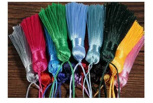 Close-up of colorful handmade silk tassels for fans and DIY jewelry crafts