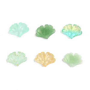 Set of six colorful ginkgo leaf pendants in resin for DIY jewelry making and crafts