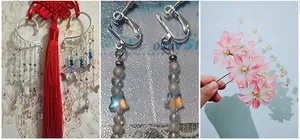 Close-up of butterfly tassels ear cuffs, star beads, and pink floral hairpins for DIY jewelry