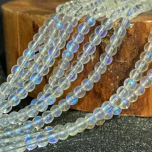 Macro shot of iridescent crystal glass beads showing aurora luster for DIY jewelry making