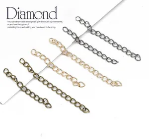 Close-up of DIY jewelry extension chains in various metal finishes for necklaces
