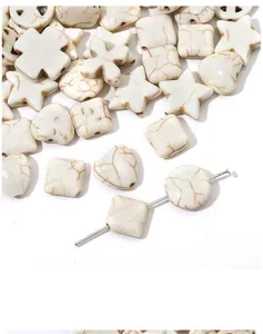 Detailed view of mixed shape natural white howlite stone beads for DIY jewelry making