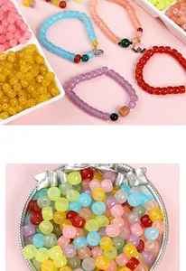 Detailed close-up of mixed colorful glass barrel beads and lucky peach charms for DIY jewelry