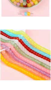 Close-up of colorful 8x6mm glass barrel beads for DIY bracelet and necklace making