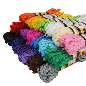 Multi-colored rickrack zigzag ribbon rolls for DIY sewing crafts and curtain decoration