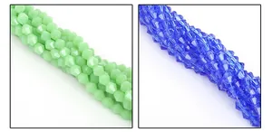Macro shot of 4mm faceted diamond-shaped crystal glass beads in green and blue colors