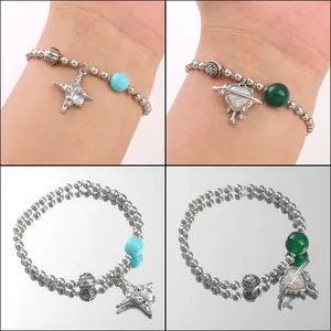 Y2K style beaded bracelets featuring heart-shaped planet and hollow star pendants