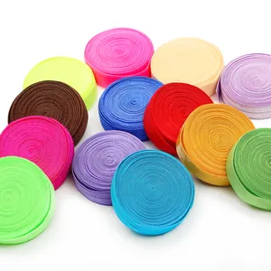Colorful elastic ribbon set for DIY sewing and crafts shown in multiple vibrant rolls