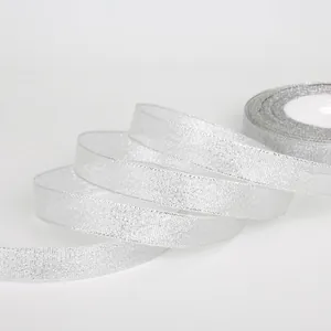 Sparkling silver metallic ribbon roll for DIY gift wrapping and wedding crafts
