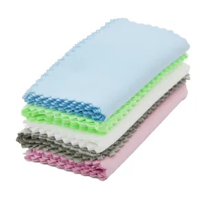 Stack of colorful microfiber cleaning cloths with zigzag edges for jewelry and glasses