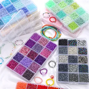 DIY bead set with colorful seed beads and love charms in a clear storage box