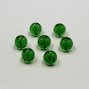 Set of seven translucent green glass round beads for DIY handmade jewelry crafts
