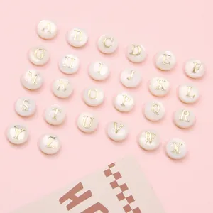 Set of 26 white shell flat round beads with gold alphabet A-Z for DIY jewelry making