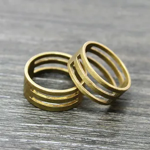 Three-line hollow stainless steel jump ring opening tool with a vintage brass finish