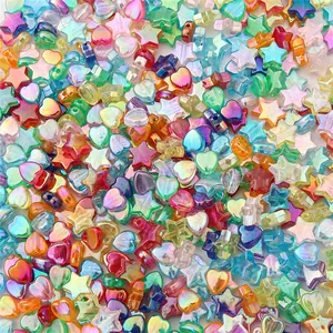 Macro detail of colorful AB coated star and heart acrylic beads for DIY jewelry making