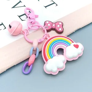 Rainbow pendant keychain with pink bow, bell and pastel chain for school bags
