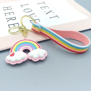 Rainbow cloud keychain with colorful silicone wrist strap and gold metal keyring pendant
