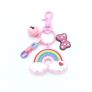 Rainbow and white cloud keychain with pink bell and polka dot bow for student bags