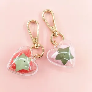 Creative heart-shaped preserved flower keychain with gold clasp for women handbags