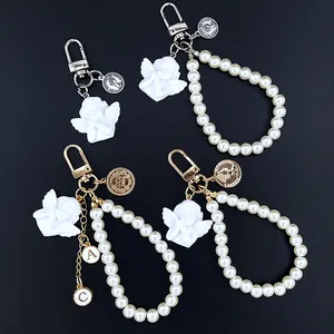 Barock Skulptur Engel Künstliche Perle Schlüsselanhänger Retro Münze Tasche Anhänger Für Damen Airpods Case Dekoration Schmuck