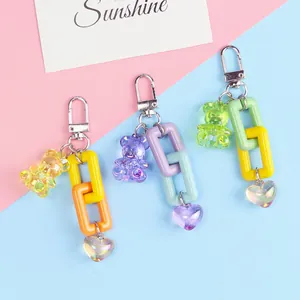 Cute resin bear keychains with colorful chains and hearts for bags and AirPods