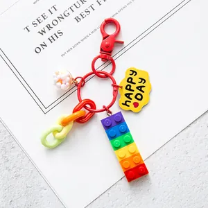 Rainbow brick car keychain with yellow cloud and glass ball charms for bag decoration