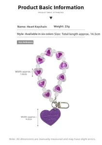 Macro view of purple heart bead keychain with size measurements and product details