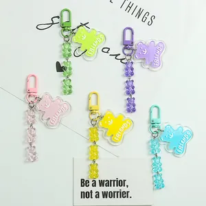 Detailed set of five colorful acrylic bear keychains with metal spring hooks and tags