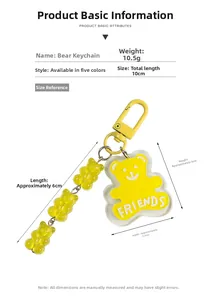 Detailed view of the yellow acrylic bear keychain with measurements and dimensions