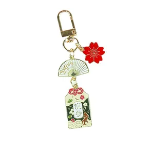 Porte-clés de style japonais avec omamori, fleur de cerisier et pendentifs d'éventail
