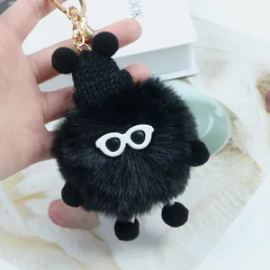 Portachiavi carino a pompon nero con occhiali e cappello per decorare borse